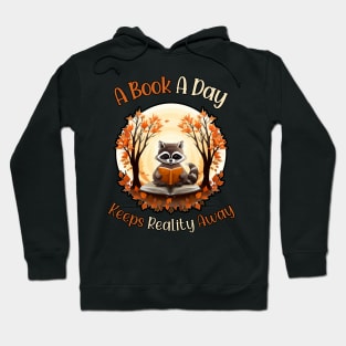 A Book A Day Keeps Reality Away Cute Raccoon Reading Hoodie